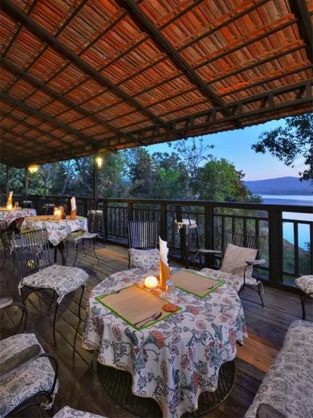 Rooftop dinner setup at Denwa Backwater Escape Satpura